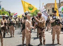 تلاش دولت عراق برای خلع سلاح الحشد الشعبی تایید شد/ وزیر خارجه عراق: وجود سلاح خارج از کنترل دولت موضوعی غیرقابل قبول است