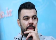 واکنش علی‌اکبری به حواشی مجازی رقیب آمریکایی/آدم ترسو با عکس اسلحه کری می‌خواند!