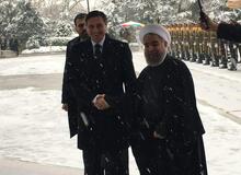 استقبال رسمی روحانی از همتای اروپایی اش در زیر بارش برف+ عکس