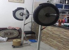 تصویری دردناک از دختران وزنه‌بردار/ تمرین با سیمان و لاستیک موتورسیکلت در خانه!